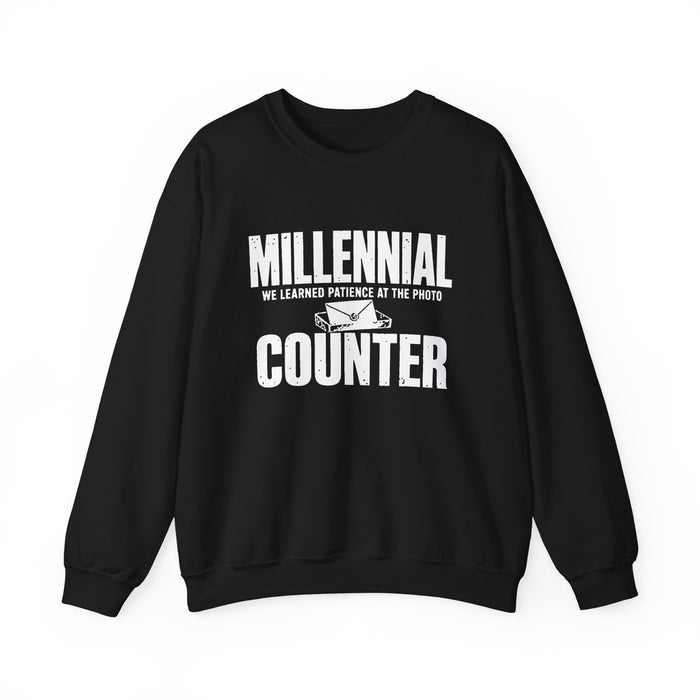 We Learned Patience at the Photo Counter Millennial crewneck sweatshirt in black, front view